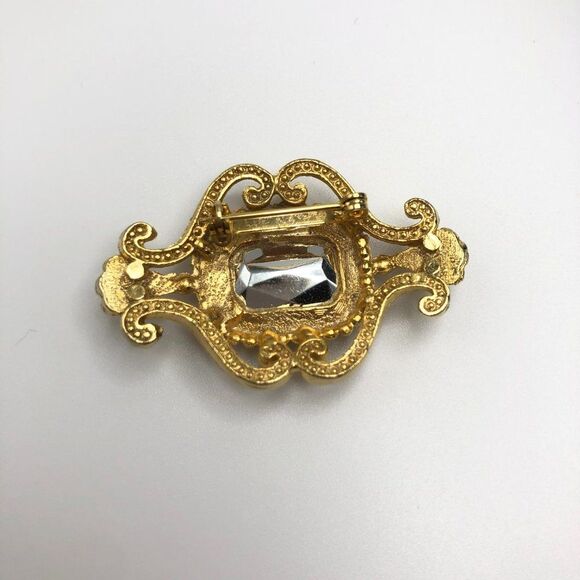 Vintage Regency Brooch Pin Gold Purple Glass Rhinestone Scroll Radiant Cut - Picture 2 of 4